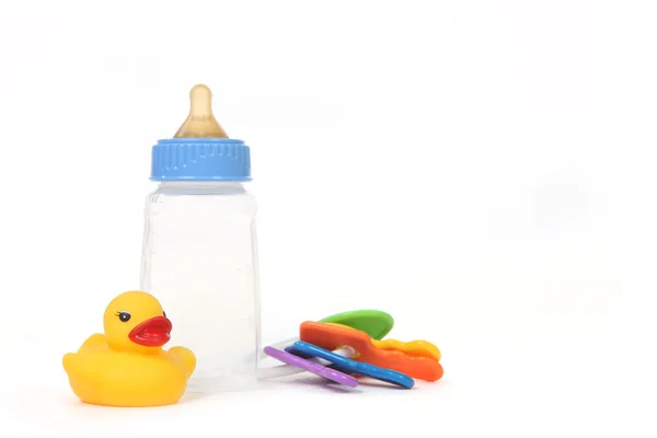 Kauçuk duckie ile bebek biberon — Stok fotoğraf
