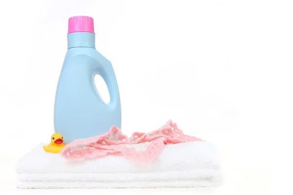 Baby Girl Laundry Items With Bottle of D — Stock Photo, Image