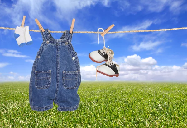 stock image Baby Boy Child Clothes Hanging Outdoors