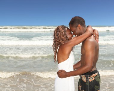 African American Couple on the Beach Hap clipart