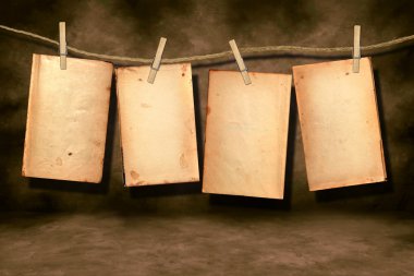 Distressed Worn Book Pages Hanging clipart