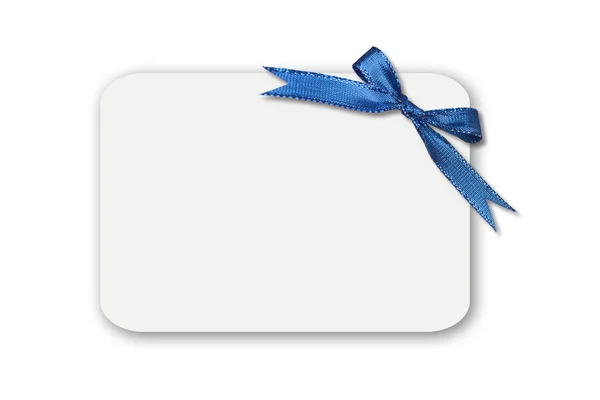 Arco en una tarjeta de regalo blanca en blanco — Foto de Stock