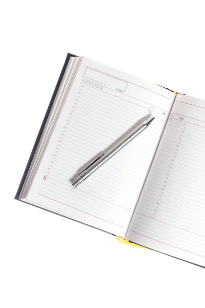 Календарь и ручка — стоковое фото