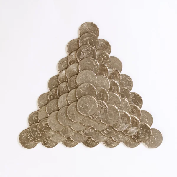 Pyramid made of coins — Stock Photo, Image