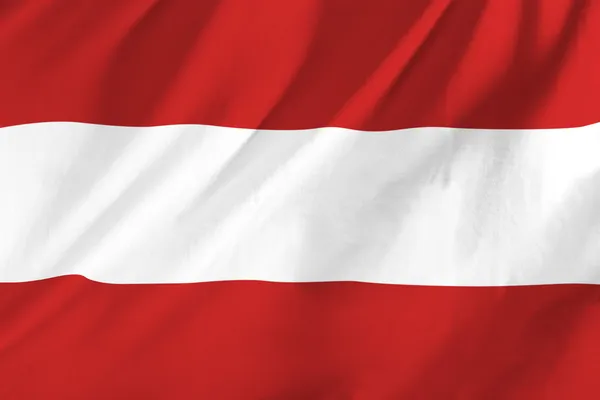 Österreichische Flagge weht im Wind — Stockfoto