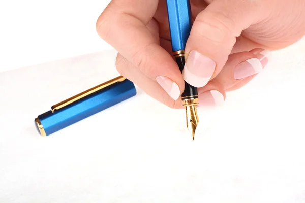 Stift und Hand auf weiß — Stockfoto