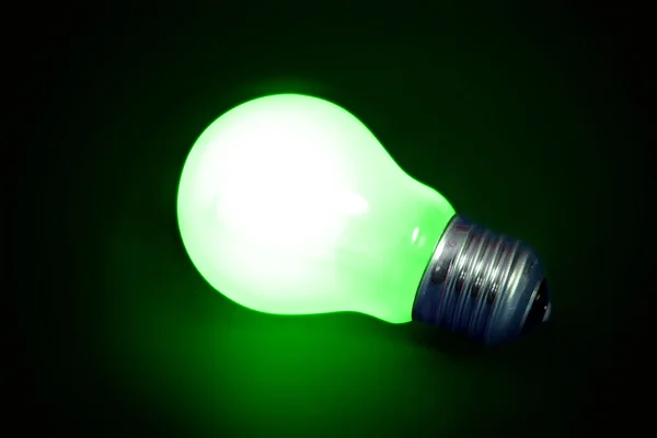 Fundo com lâmpada acesa — Fotografia de Stock