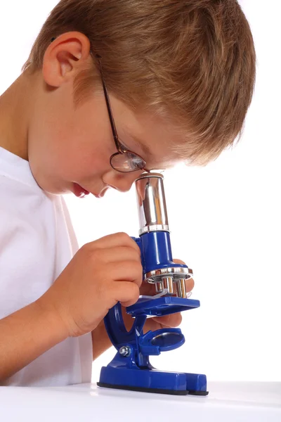 stock image The boy with a microscope