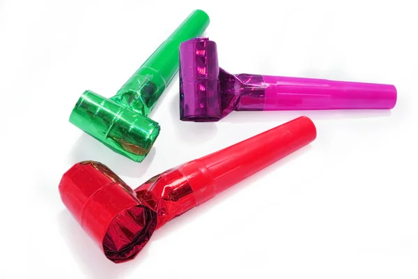 Party Blowers on white background — Stock Photo, Image