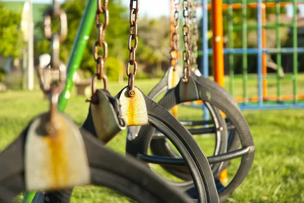 Swings on a playground — Stock Photo, Image
