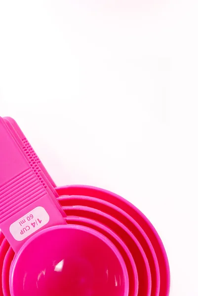 ピンクのプラスチック道具を焼く — ストック写真