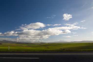 Open road with clouds clipart