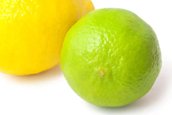 Fresh green lime and lemon isolated — Stock Photo, Image