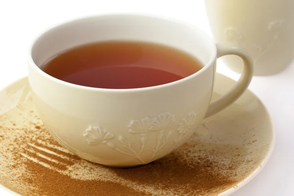 Kopje thee en schotel — Stockfoto