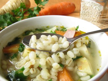 Vegetable soup with barley grains clipart