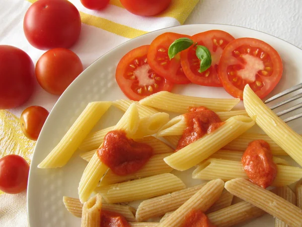 Pasta with tomato pesto — Stock Photo, Image