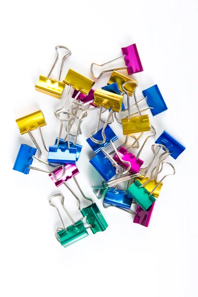 stock image Colorful paperclips on white