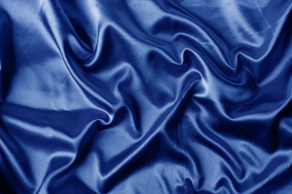 Элегантный синий атласный фон — стоковое фото