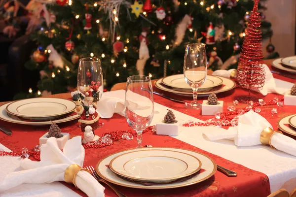 クリスマスの夕食のテーブル ストックフォト