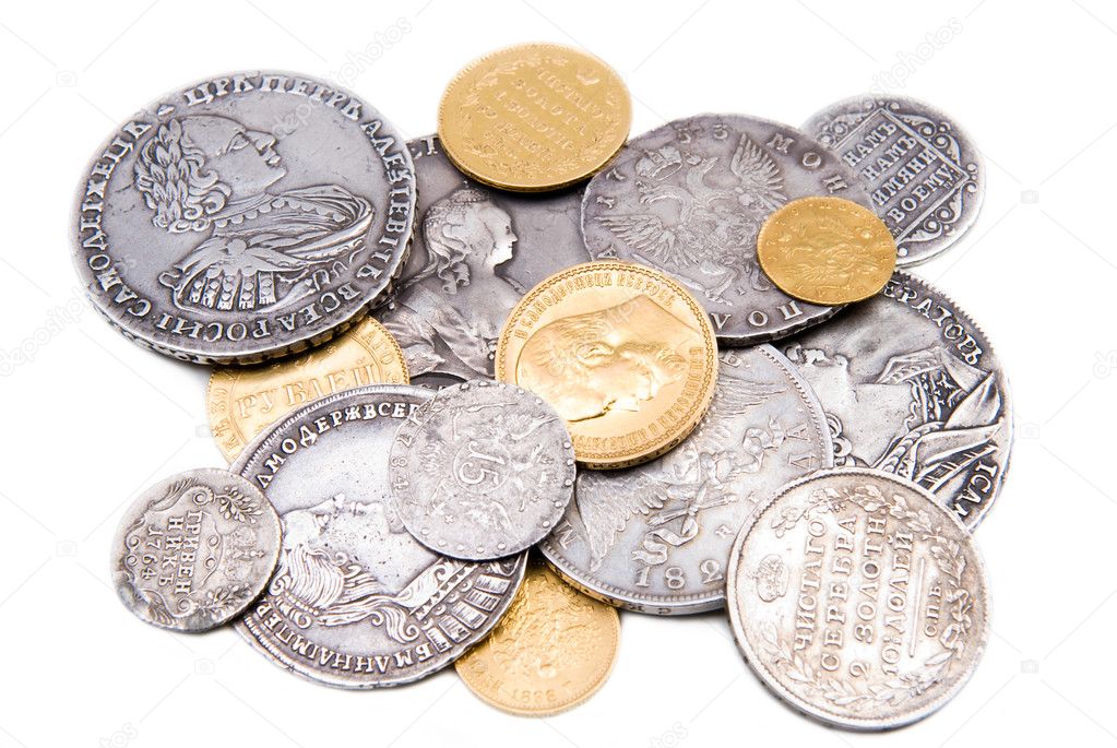 Old gold and silver coins isolated on wh