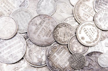 Old silver coins background (part 2) clipart