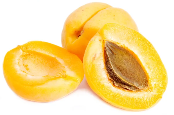 Apricots with halves — Stock Photo, Image