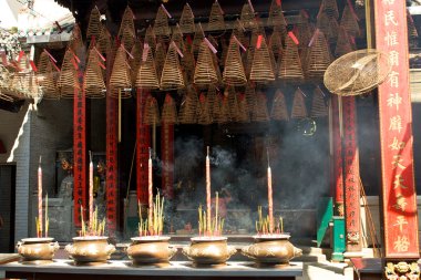 Pagoda with incense sticks clipart