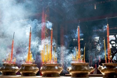 Incense sticks in pagoda clipart