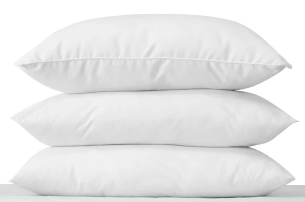 Białe poduszki. na białym tle — Zdjęcie stockowe