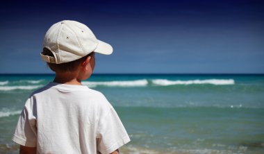 Boy at the beach clipart