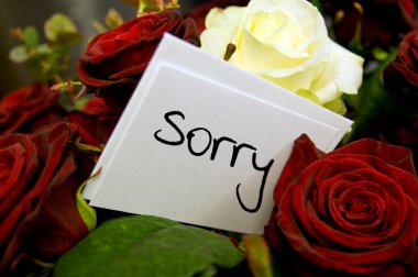 Bouquet of roses with apology card clipart