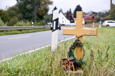 Crucifix near the road clipart