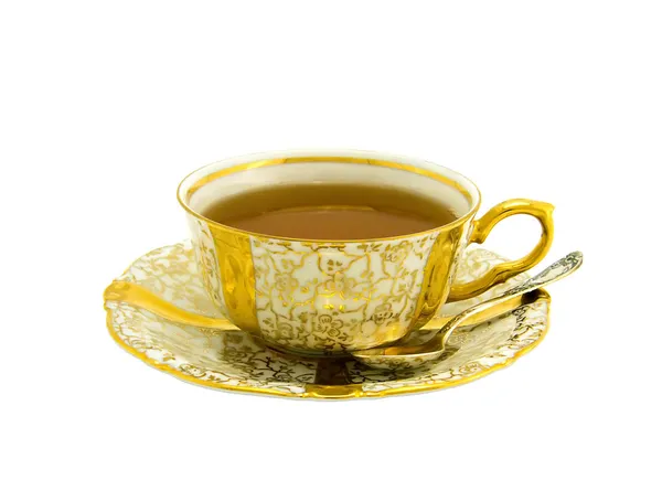 Tasse en porcelaine d'or d'un ensemble de thé — Photo