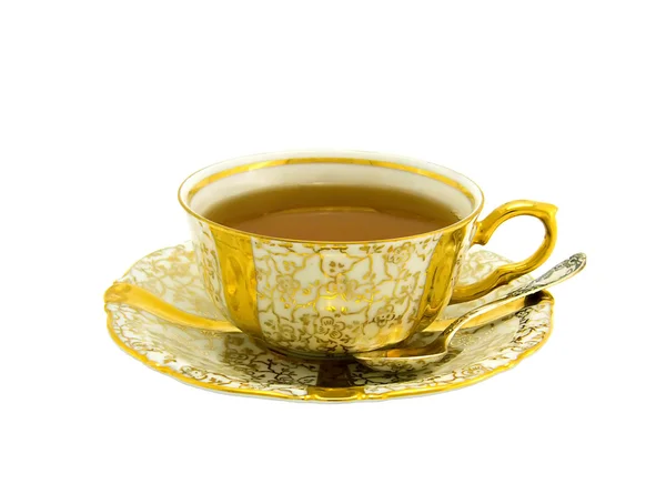 ゴールドの磁器のカップからお茶セット — ストック写真
