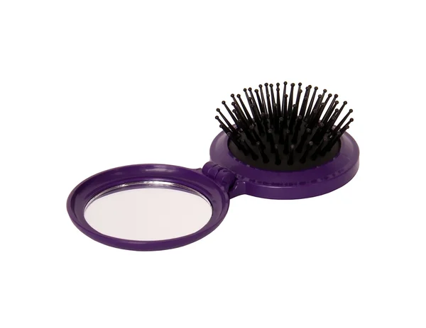 Mirror with hairbrush — Stock Photo, Image