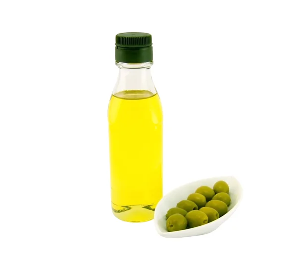 Бутылка оливкового масла и оливок — стоковое фото