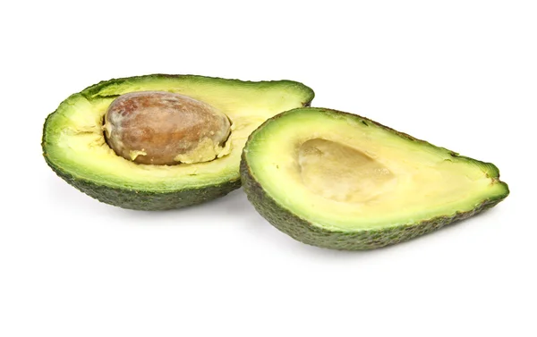 Frutto di avocado maturo di taglio su bianco — Foto Stock