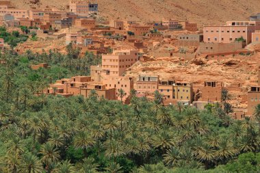 Village among Moroccan hills clipart