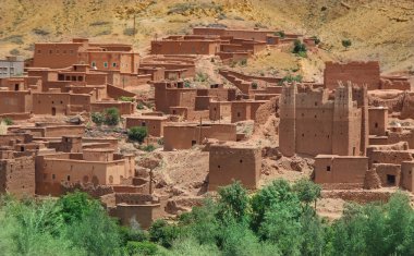 Village among Moroccan hills clipart