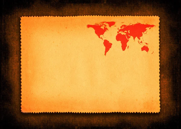Trozo de papel con pequeño mapa del mundo —  Fotos de Stock