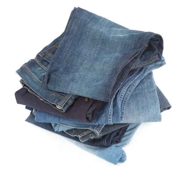 Hromadu modré džíny — Stock fotografie