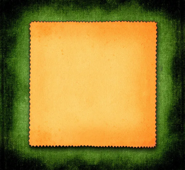 Papel sobre fundo verde — Fotografia de Stock