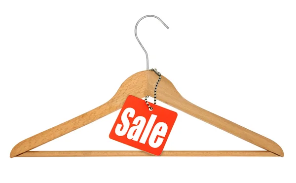 Coat hanger and sale tag — Stock Photo, Image