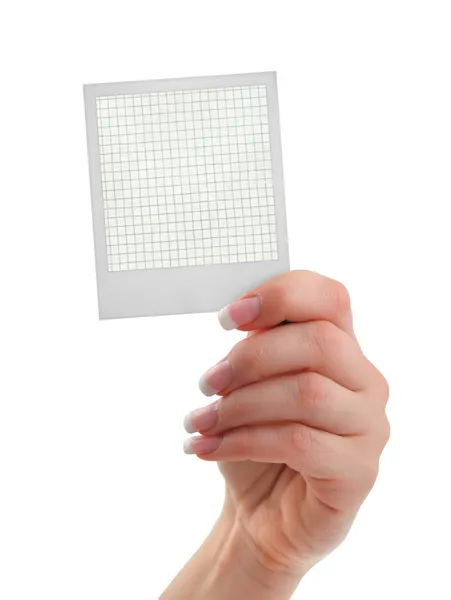 Female hand holding a photo frame — Stock Photo, Image