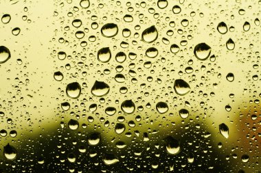 Background made of water drops on glass clipart