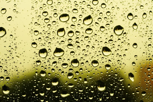 Hintergrund aus Wassertropfen auf Glas — Stockfoto