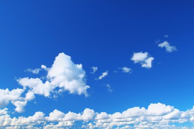 Summer sky with cumulus clouds clipart