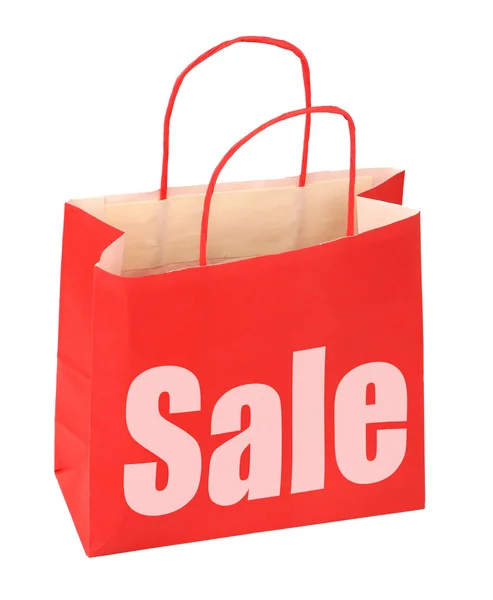 Мешок для покупок с красным знаком продажи — стоковое фото