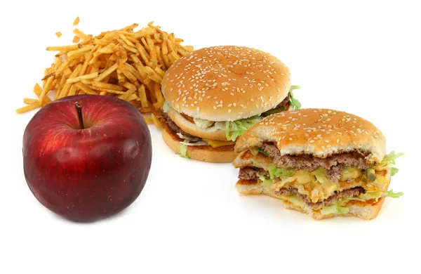 Junk Food und Apfel — Stockfoto