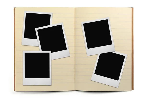 Lined exercise book and photo frames — Stock Photo, Image